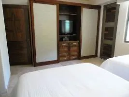 호텔 Mimosa Tree Condos 신데 델 카르멘